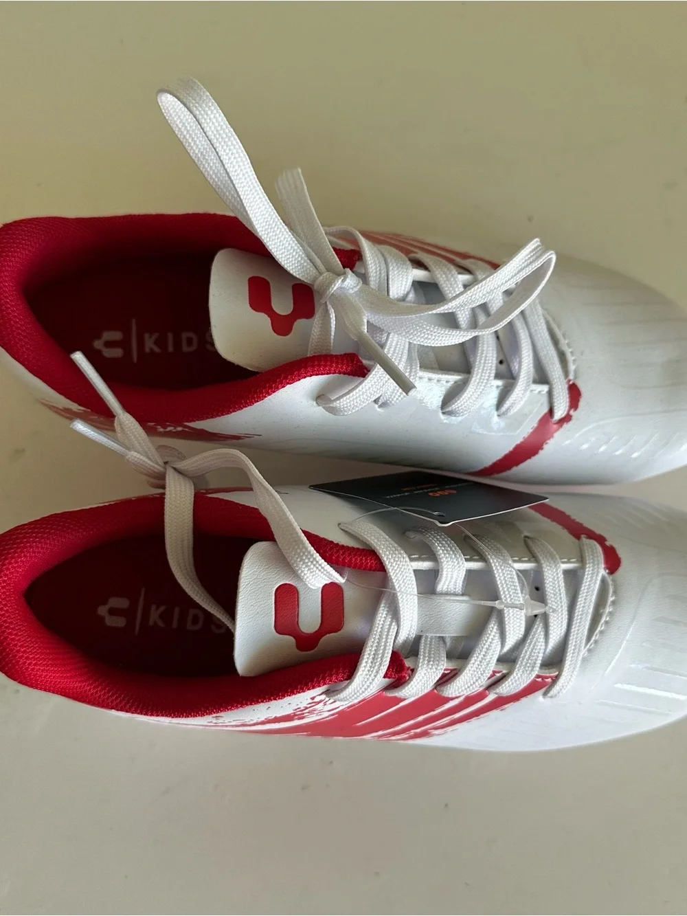 Charly Grasshopper Youth firm ground cleats Size:2.5